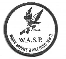 In 1943, patch featuring the WASP mascot Fifinella, designed by Walt Disney, worn on Nadine’s flight jacket.
