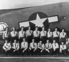 In 1944, WASP members of the Air Transport Command’s Sixth Ferrying Group pose for a portrait, including Nadine Ramsey (standing, far left) and commander B.J. Erickson (standing, far right) at U.S. Army Air Field in Long Beach, California.