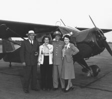 In June 1945, Nadine borrowed a ‘red racer’ to fly brother Ed Ramsey from San Francisco to Wichita, where they were met by aviation tycoon Walter Beech (far left) and mother Nelle Ramsey (far right).