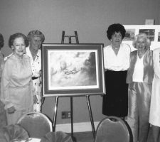 In 1990 Nadine attended a WASP reunion in Seattle, Washington, where she posed with fellow Sixth Ferrying Group alumnae with a painting honoring the WASP by artist Dan Kelly; pictured (l-r) Mary Lou Colbert McNeale, Nadine Ramsey, Iris Cummings Critchell, Barbara Erickson London, Lauretta Beatty Foy, and Katy Loft Strehle.